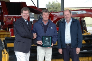 Peter Brotherson, Ken Mason and Garry Kachel Celebrating 50 Years New Holland